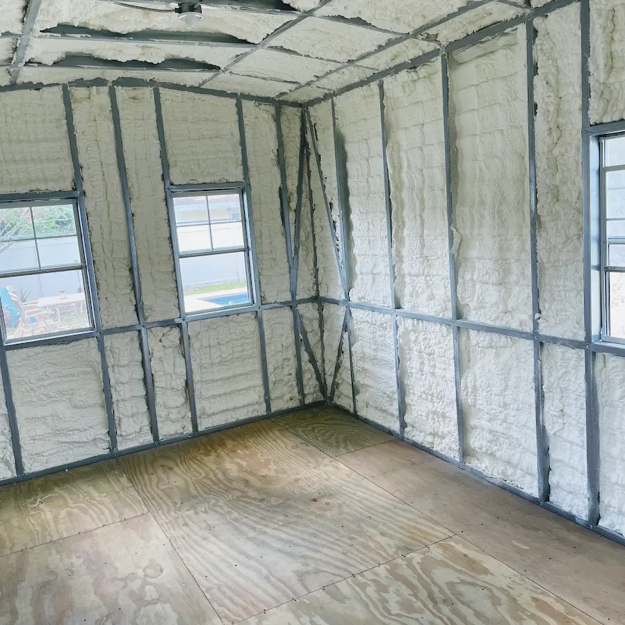 Closed-cell spray foam insulation applied to wall cavities in a residential project in Peru
